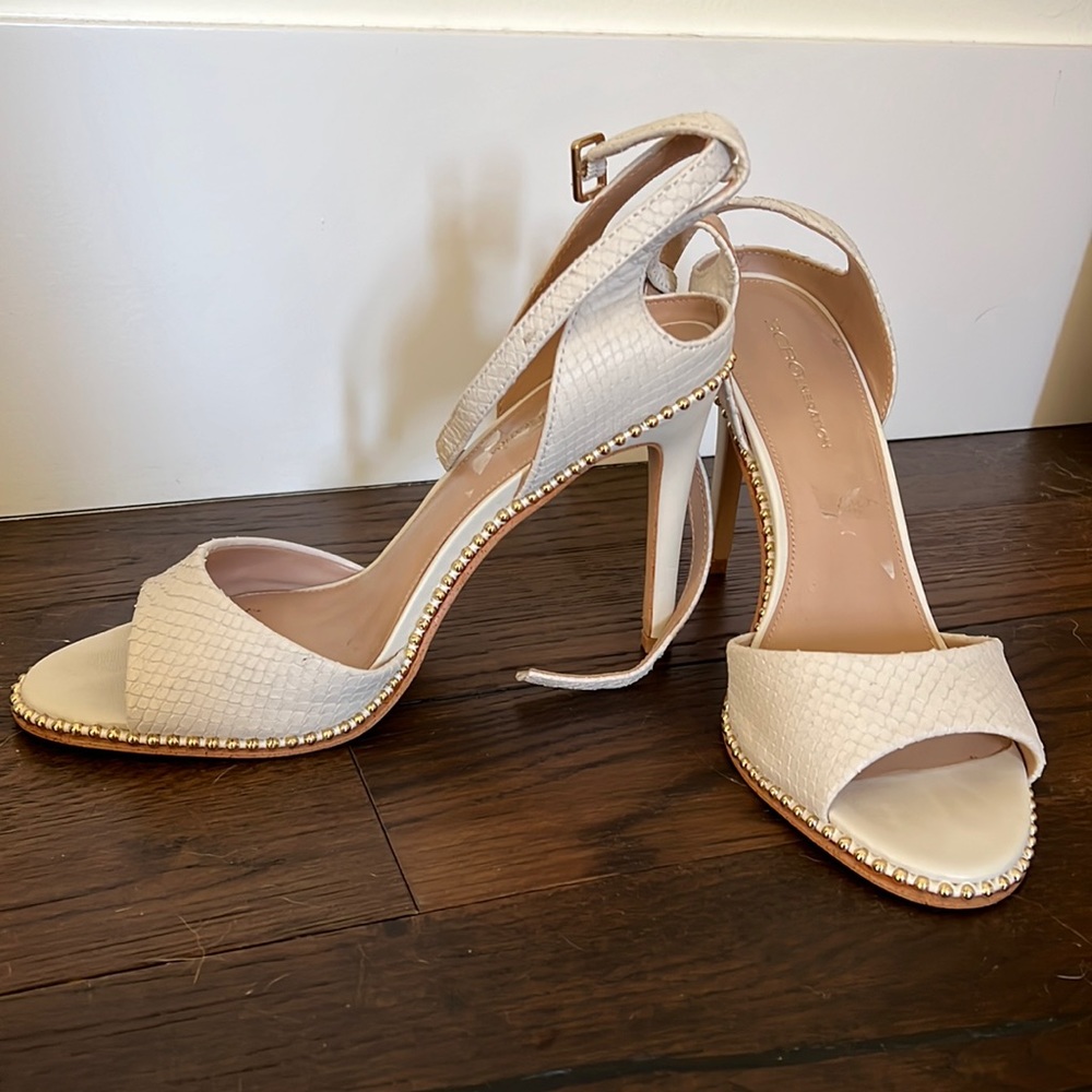 BCBG heels Ivory color with gold details and sneak skin texture
